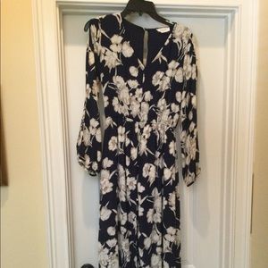 Ladies multicolor romper with long skirt by Peach Love. Size S.